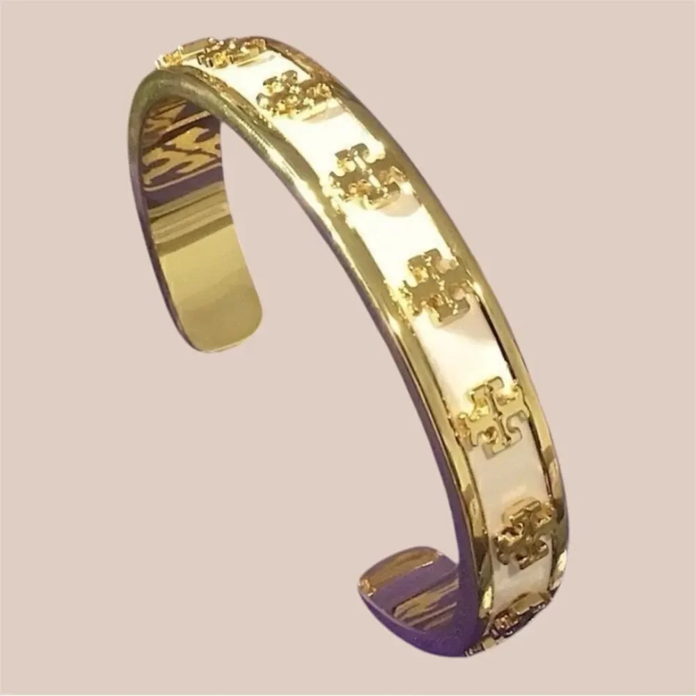 TORY BURCH LACQUERED RAISED KIRA LOGO STUDDED BRACELET